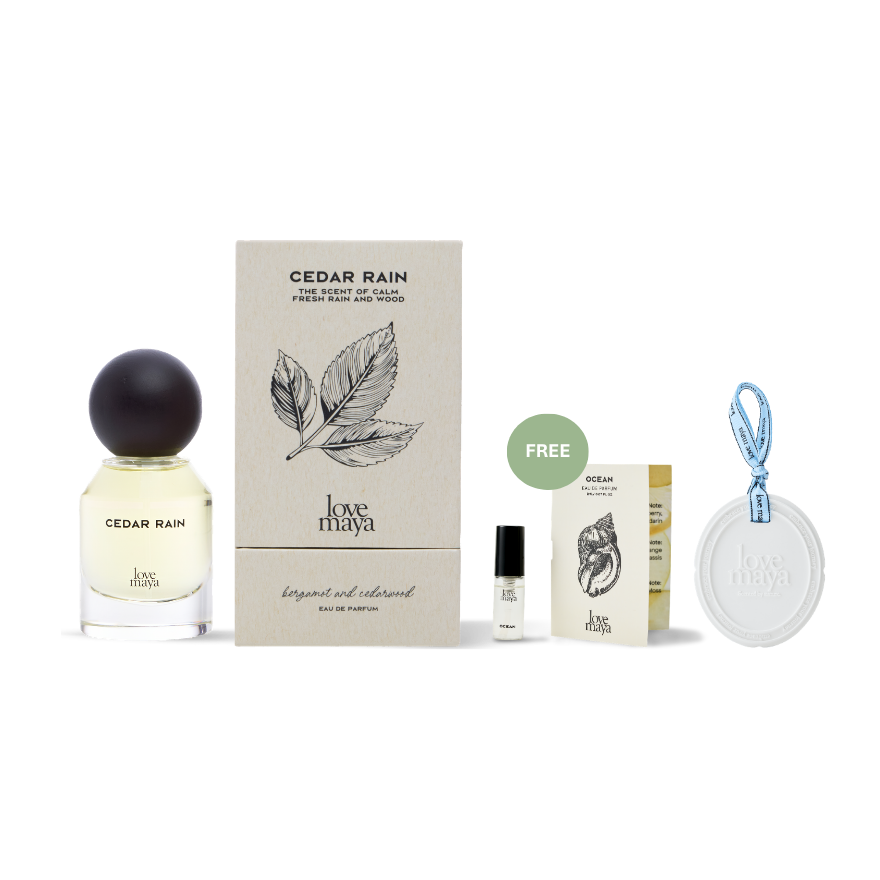 Love Maya Cedar Rain perfume set with box, 2ML Ocean Mini Perfume, and a perfume stone on a white background