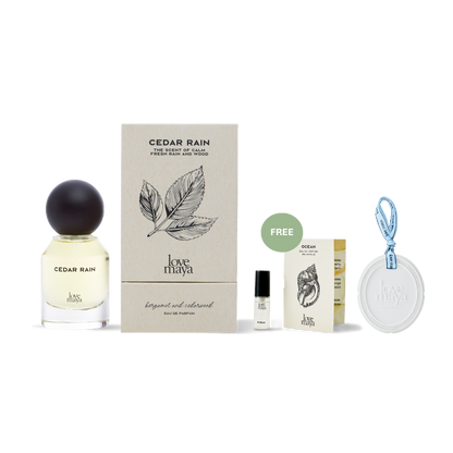 Love Maya Cedar Rain perfume set with box, 2ML Ocean Mini Perfume, and a perfume stone on a white background