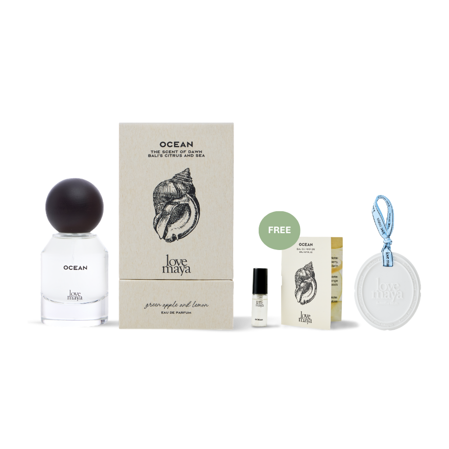 Love Maya perfume set with bottle, box, 2ML Ocean Mini Perfume, and a perfume stone on a white background