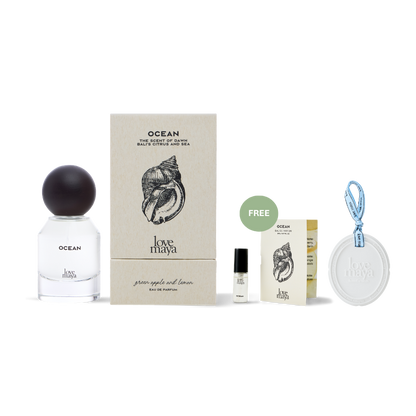 Love Maya perfume set with bottle, box, 2ML Ocean Mini Perfume, and a perfume stone on a white background